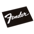 The image shows a black rectangular magnet featuring the iconic white Fender script logo. Fender is a renowned guitar maker famous for models like the Stratocaster and Telecaster. This branded magnet is a simple, classic accessory that fans and guitar enthusiasts might use to show their loyalty on metal surfaces. The clean black and white design reflects Fender’s timeless aesthetic.
