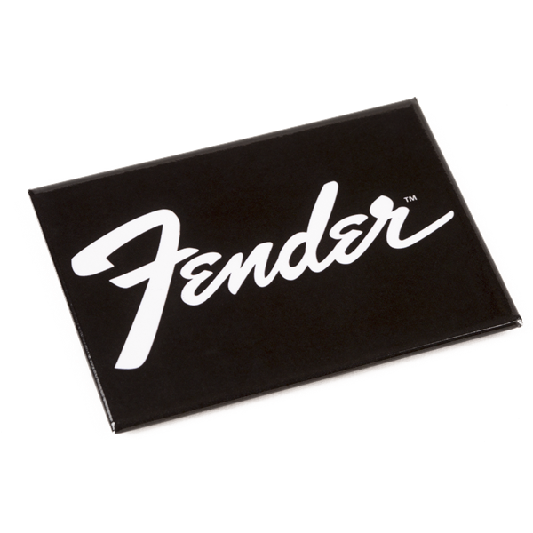 The image shows a black rectangular magnet featuring the iconic white Fender script logo. Fender is a renowned guitar maker famous for models like the Stratocaster and Telecaster. This branded magnet is a simple, classic accessory that fans and guitar enthusiasts might use to show their loyalty on metal surfaces. The clean black and white design reflects Fender’s timeless aesthetic.
