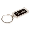 The image shows a Fender keychain featuring a rectangular metal charm with a black center displaying the white Fender logo in signature script. The charm has a decorative beaded border and is attached to a standard split-ring. This music-themed accessory is popular among musicians and fans as a collectible or gift, representing the iconic brand known for electric guitars and amplifiers.