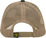 The image shows a tan/khaki baseball or trucker hat with mesh panels, a green button on top, and an adjustable strap with a small logo on the back. There are no visible musical instruments or music industry-related items. It appears to be a regular piece of headwear with no clear connection to the musical instrument industry. Please confirm if this is the correct image or clarify any music-related association.