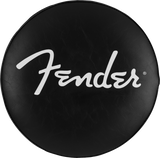 The image shows a Fender-branded bar stool with a circular black vinyl seat featuring the white Fender logo and registered trademark symbol in the center. The textured, leather-like seat has visible wear, adding character. This type of stool is commonly used in music studios, guitar shops, and home music rooms as a stylish accessory from the well-known guitar and amplifier brand Fender.