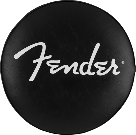 The image shows a Fender-branded bar stool with a circular black vinyl seat featuring the white Fender logo and registered trademark symbol in the center. The textured, leather-like seat has visible wear, adding character. This type of stool is commonly used in music studios, guitar shops, and home music rooms as a stylish accessory from the well-known guitar and amplifier brand Fender.