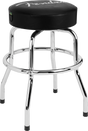 The image shows a Fender barstool with a round, padded black vinyl seat featuring the white Fender logo. It has a chrome steel frame with four legs, a circular footrest, and rubber caps on the feet to protect floors. Styled like a classic diner stool, it’s popular among musicians for practice or studios, combining functionality with iconic Fender branding.