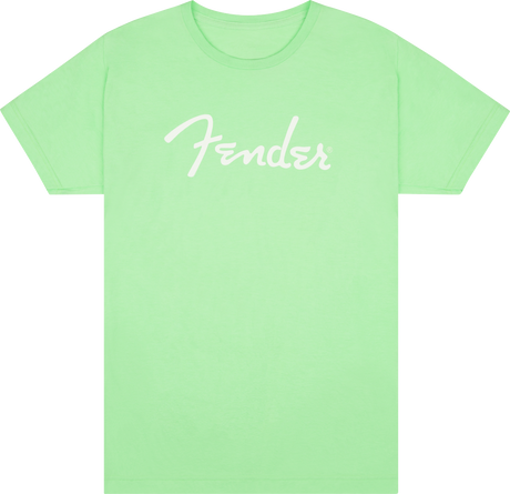 The image shows a light green t-shirt with the iconic white "Fender" logo across the chest. Fender is a legendary musical instrument brand known for classic electric guitars like the Stratocaster and Telecaster, as well as amplifiers. This official Fender apparel allows musicians and fans to express their connection to the brand beyond instruments.