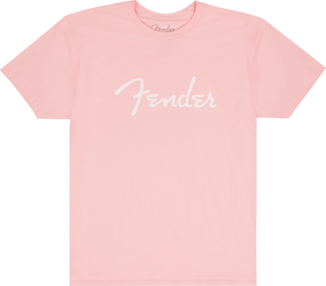 The image shows a pink/coral t-shirt with the white "Fender" logo prominently displayed across the front and a smaller logo at the neck tag. This branded apparel is from Fender, the iconic guitar and amplifier maker known for classic instruments like the Stratocaster and Telecaster, popular among musicians and fans since 1946.