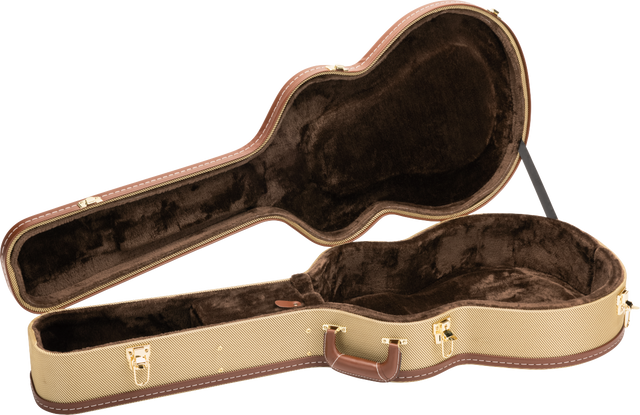 The image shows an open hard shell guitar case with a tan tweed exterior and brown leather trim. It features gold metal latches, a brown leather handle, and a guitar-shaped interior lined with dark plush velvet to protect the instrument. The vintage-style case offers sturdy protection, ideal for safely transporting acoustic or electric guitars, and complements classic or high-end instruments.