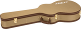 The image shows a hardshell acoustic guitar case with a tan tweed-textured exterior and brown leather trim. It features three gold metal latches and a brown leather handle on the side. The word "GUITAR" is embossed or printed on the top. The case is designed to provide a sturdy, form-fitting protection for an acoustic guitar during transport and storage.