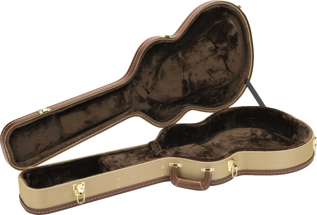 The image shows an open hardshell acoustic guitar case with a tan textured exterior and brown leather-like trim. Its interior has dark brown plush lining and a molded compartment shaped to securely hold the guitar. Gold-toned metal latches, hinges, and an exterior handle are visible. This professional-grade case offers sturdy protection for safe transport and storage of acoustic guitars.