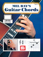 The image shows the cover of "Mel Bay's Guitar Chords" instruction book, featuring a close-up of a hand on a reddish-brown acoustic guitar fretboard, an inset hand position photo, a C chord diagram, the Mel Bay logo, and an "Online Video" icon, indicating digital learning resources. The cover highlights visual and diagrammatic tools for guitar chord instruction.