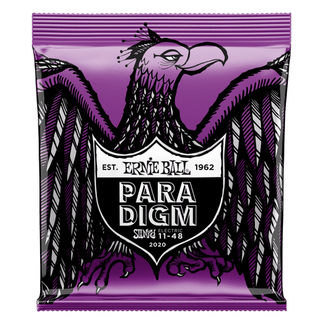 Ernie Ball Paradigm guitar string package with an eagle design on a purple background