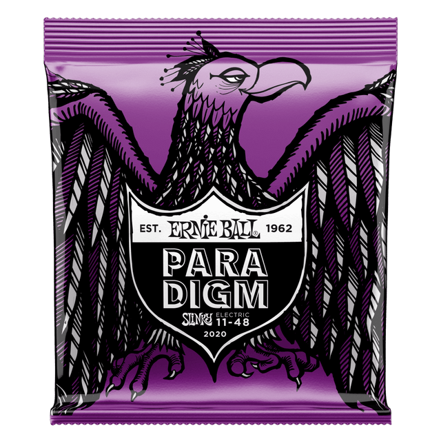 Ernie Ball Paradigm guitar string package with an eagle design on a purple background