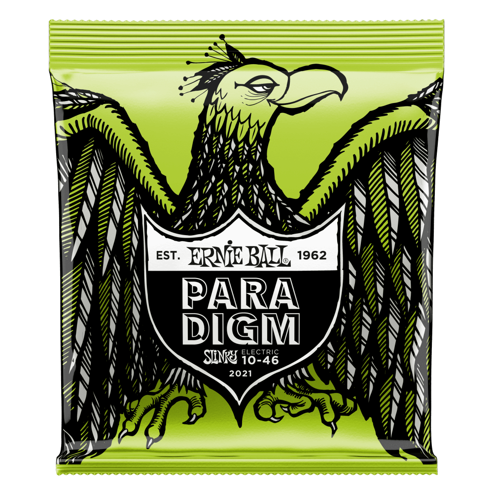 A package of Ernie Ball Paradigm guitar strings with eagle artwork on a green background