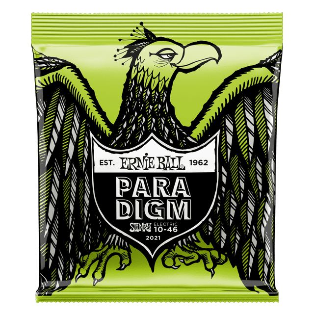 A package of Ernie Ball Paradigm guitar strings with eagle artwork on a green background