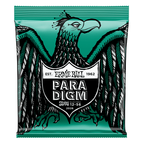 A package of Ernie Ball Paradigm guitar strings with eagle artwork on a green background