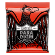 A package of Ernie Ball Paradigm guitar strings with eagle artwork on a red background