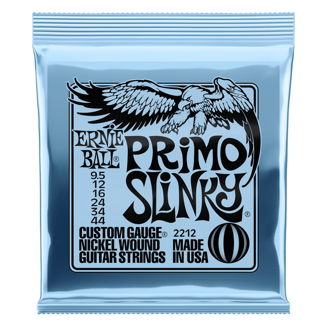 Ernie Ball Primo Slinky guitar strings packaging with an eagle logo on a clear background
