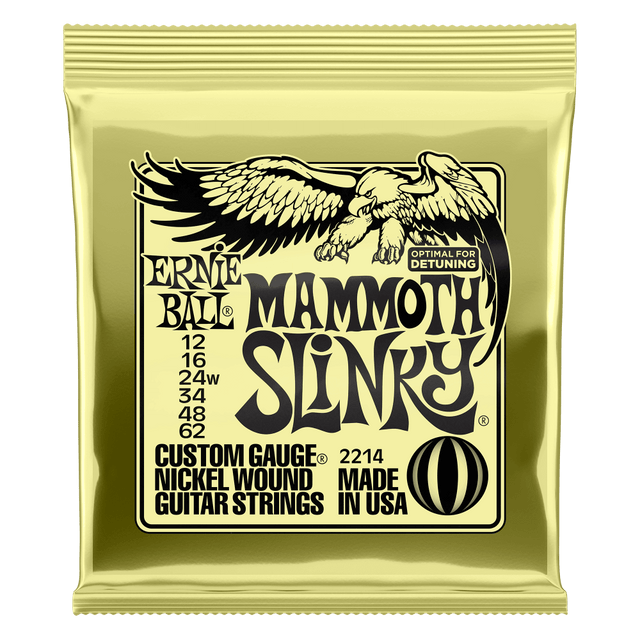 Ernie Ball Mammoth Slinky guitar string package on a black background