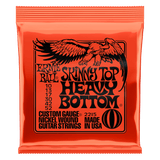 Ernie Ball Skinny Top Heavy Bottom guitar strings orange packaging with an eagle logo on a white background