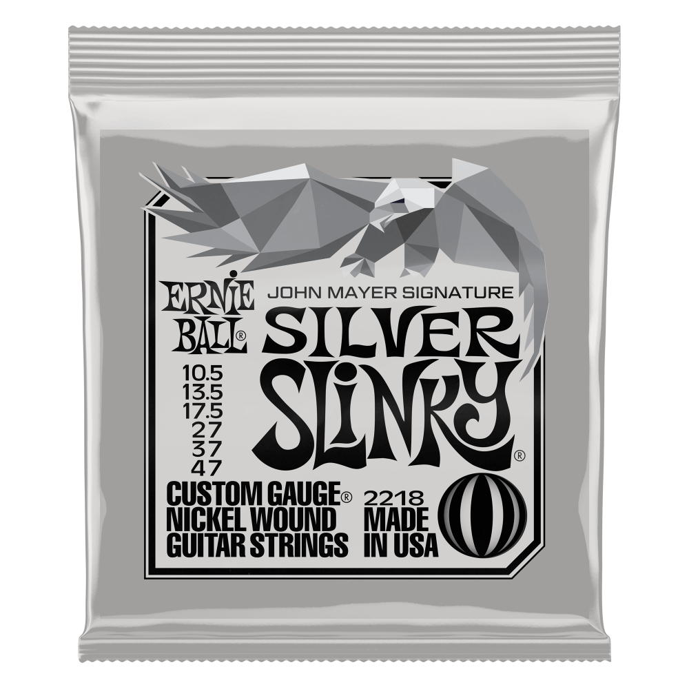 Ernie Ball Silver Slinky John Mayer guitar strings packaging on a white background
