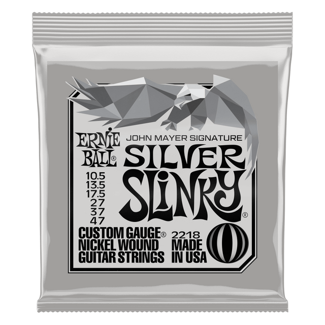Ernie Ball Silver Slinky John Mayer guitar strings packaging on a white background
