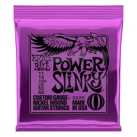 Purple Ernie Ball Power Slinky guitar string set packaging on a white background