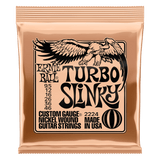 Ernie Ball Turbo Slinky guitar string package on a white background