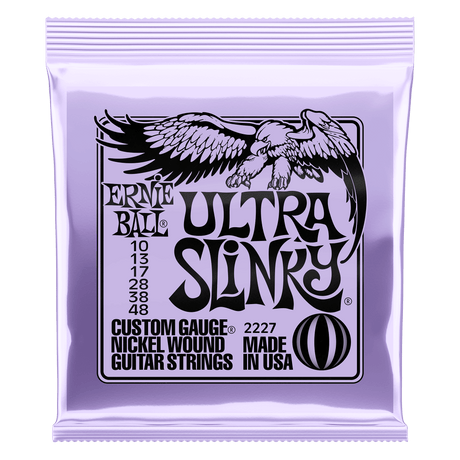 Ernie Ball Ultra Slinky guitar strings packaging with an eagle logo on a white background