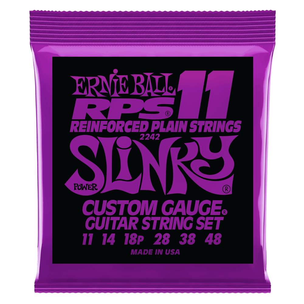 Purple packaging of Ernie Ball guitar strings with white background