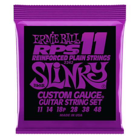 Purple packaging of Ernie Ball guitar strings with white background