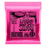 Pink packaging of Ernie Ball 7-string super slinky guitar strings with an eagle logo on a white background