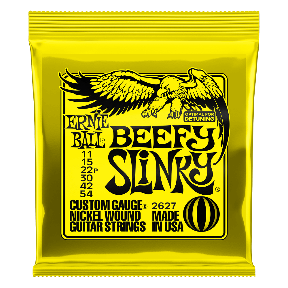 Ernie Ball Beefy Slinky guitar string packaging with yellow background and black text