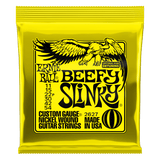 Ernie Ball Beefy Slinky guitar string packaging with yellow background and black text
