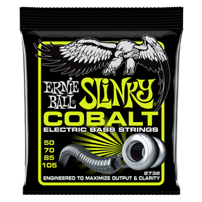 A package of Ernie Ball Cobalt Slinky electric bass guitar strings with eagle artwork on a black background