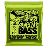A green package of Ernie Ball Slinky bass strings with black text and eagle artwork
