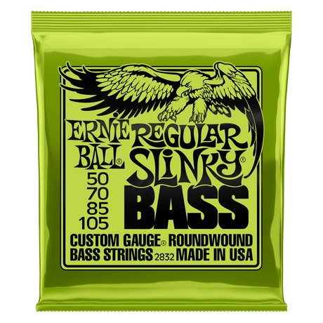A green package of Ernie Ball Slinky bass strings with black text and eagle artwork