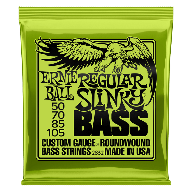 A green package of Ernie Ball Slinky bass strings with black text and eagle artwork
