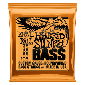 A orange package of Ernie Ball Hybrid Slinky bass strings with black lettering and eagle artwork