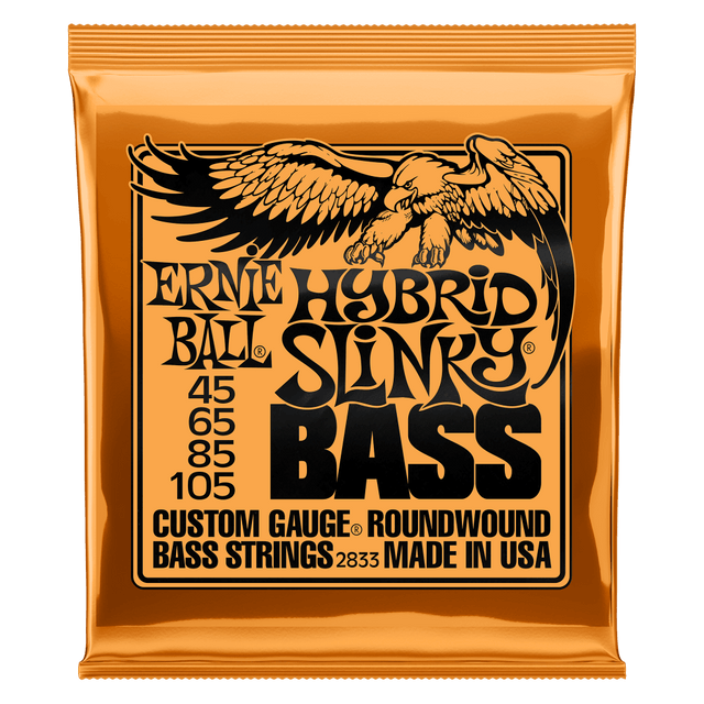 A orange package of Ernie Ball Hybrid Slinky bass strings with black lettering and eagle artwork