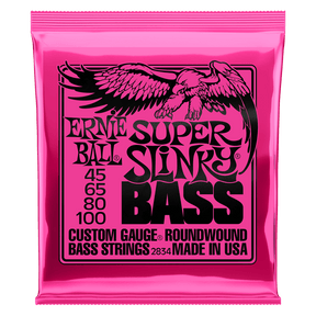 A pink package of Ernie Ball Super Slinky bass strings with black lettering and eagle artwork