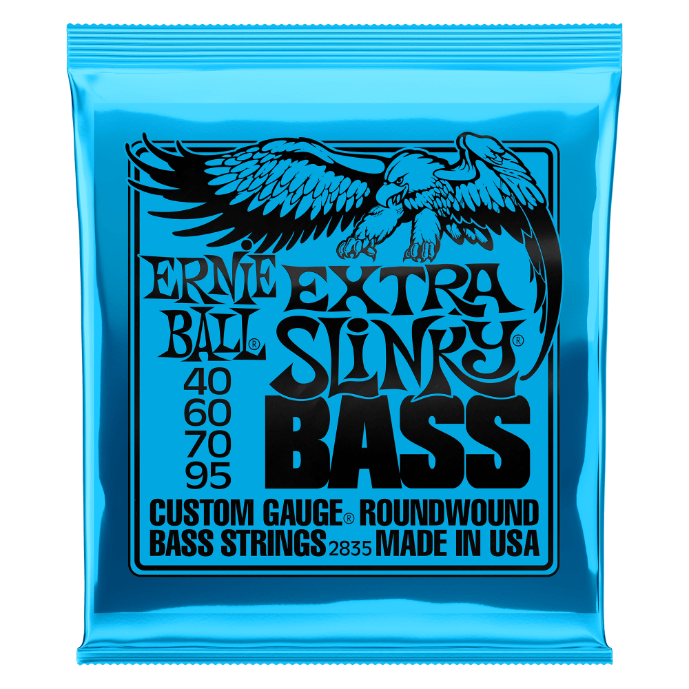 A blue package of Ernie Ball Extra Slinky bass strings with black lettering and eagle artwork