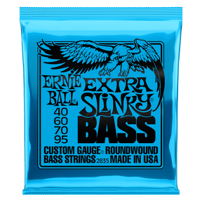 A blue package of Ernie Ball Extra Slinky bass strings with black lettering and eagle artwork
