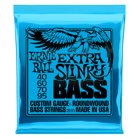 A blue package of Ernie Ball Extra Slinky bass strings with black lettering and eagle artwork
