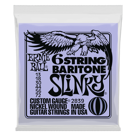 A light blue package of Ernie Ball Baritone Slinky guitar strings with eagle artwork