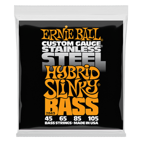 A package of Ernie Ball stainless steel bass strings on a white background