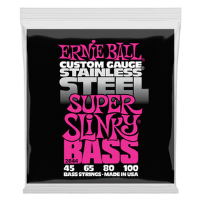 A package of Ernie Ball Stainless Steel Super Slinky bass strings on a white background