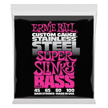 A package of Ernie Ball Stainless Steel Super Slinky bass strings on a white background