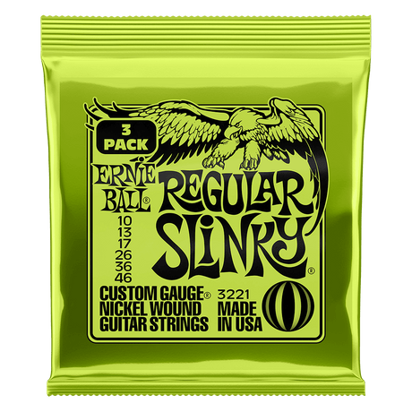 Ernie Ball Regular Slinky guitar string pack on a black background