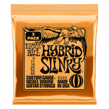 Ernie Ball Hybrid Slinky guitar strings packaging on a black background