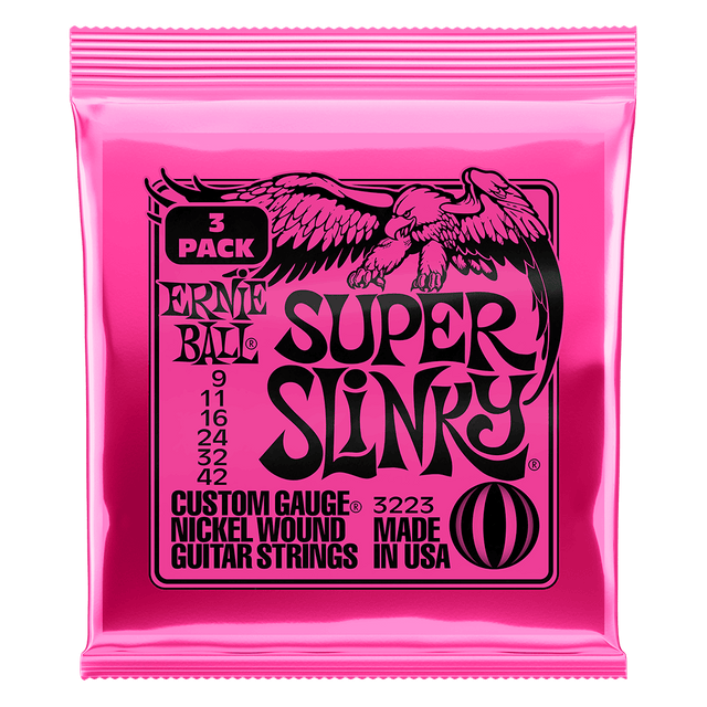 Pink packaging of Ernie Ball Super Slinky guitar strings on a black background