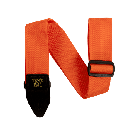Orange guitar strap with black buckle  and gold Ernie Ball logo on white background